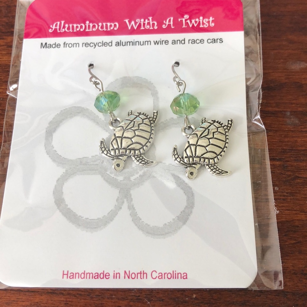 Handmade Turtle earrings
Made from recycled aluminum and race cars